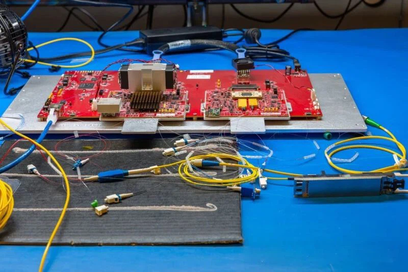 the key takeaway is that while the 800G ZR+ OSFP module may look like a slightly larger 100G SR4 QSFP28 module, its internals are vastly different. the key takeaway is that while the 800G ZR+ OSFP module may look like a slightly larger 100G SR4 QSFP28 module, its internals are vastly different.